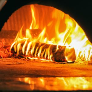 flaming-logs-inside-a-red-hot-wood-fire-oven-2022-03-31-10-31-55-utc (Custom) - Copy